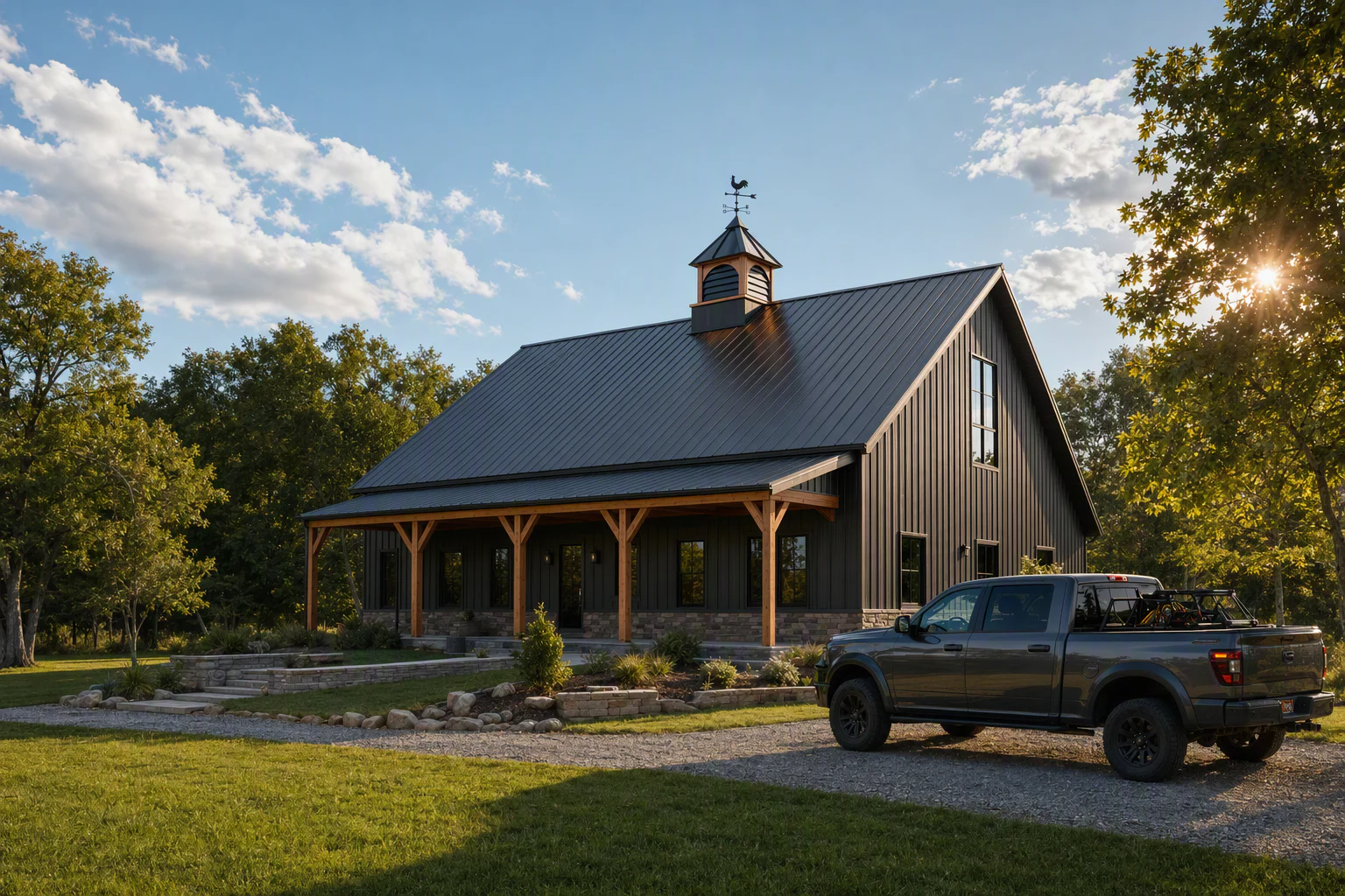 Dark metal barndominium with a Tanasi Designs cupola
