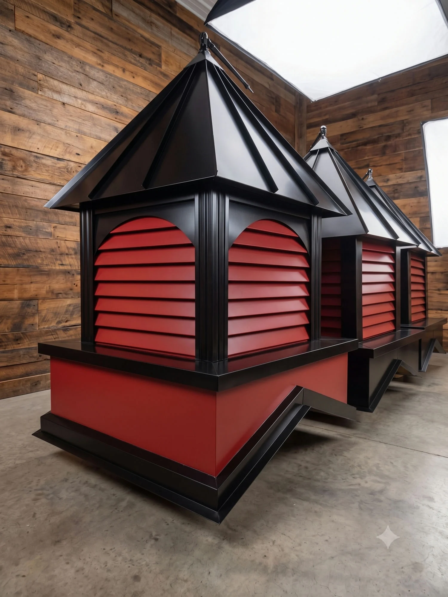 Finished red and black cupolas staged in the Tanasi Designs workshop